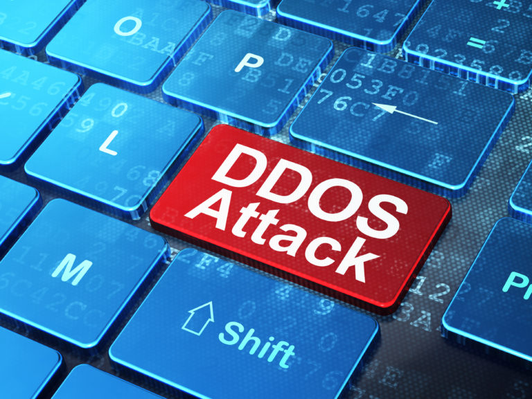 Safety concept: DDOS Attack on computer keyboard background